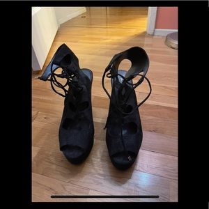 Never worn Aldo lace up black wedges